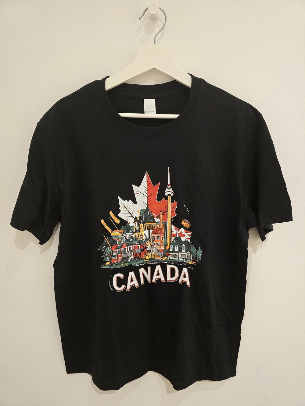 Black Canada Graphic T-Shirt with Maple Leaf Cityscape